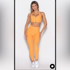 Bombshell Sportswear UPLIFT PEACH LEGGINGS in Kumquat, size small, NWT